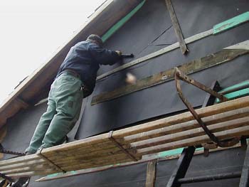 028 - Black felt paper being applied