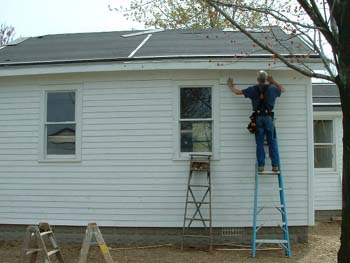 042 - Last clapboard being applied to North side