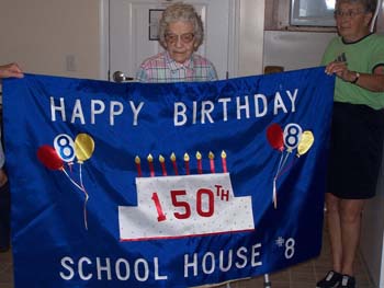 303 -150th banner went to Miss Beulah Beaver, 100 years old