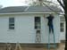 042 - Last clapboard being applied to North side