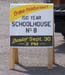 257 - Sandwich board advertising celebration of the 150th